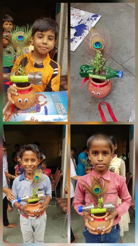 miling-Tree-celebrated-Janmashtami-with-children-where-they-planted-saplings-in-used-plastic-bottles-mounted-over-clay-pots.-The-clay-pots-were-innovatively-decorated-as-Krishna-with-Mor-pankh
